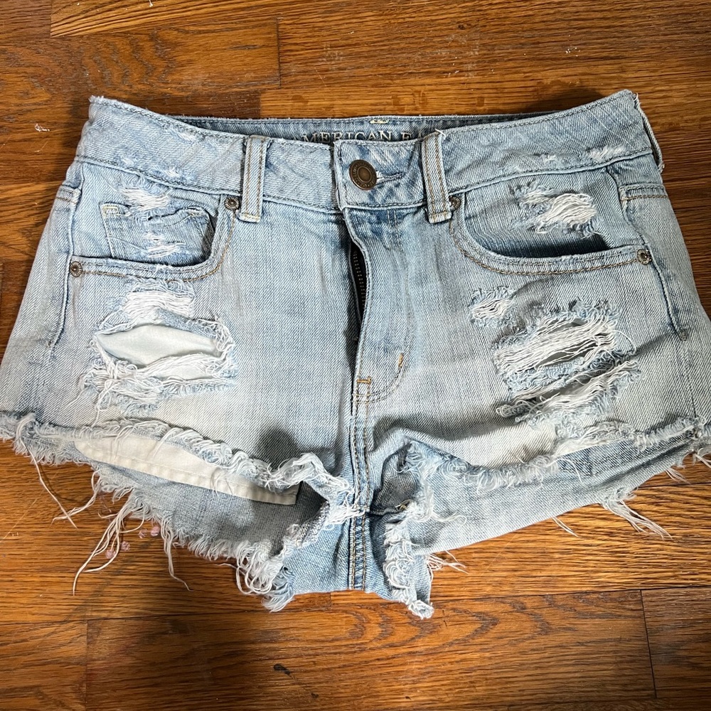 American Eagle distress light wash shorts